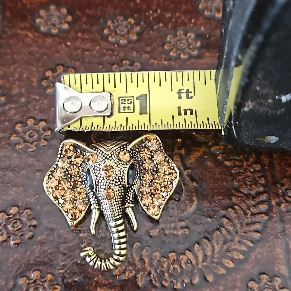NWOT Gold tone crystal elephant brooch.